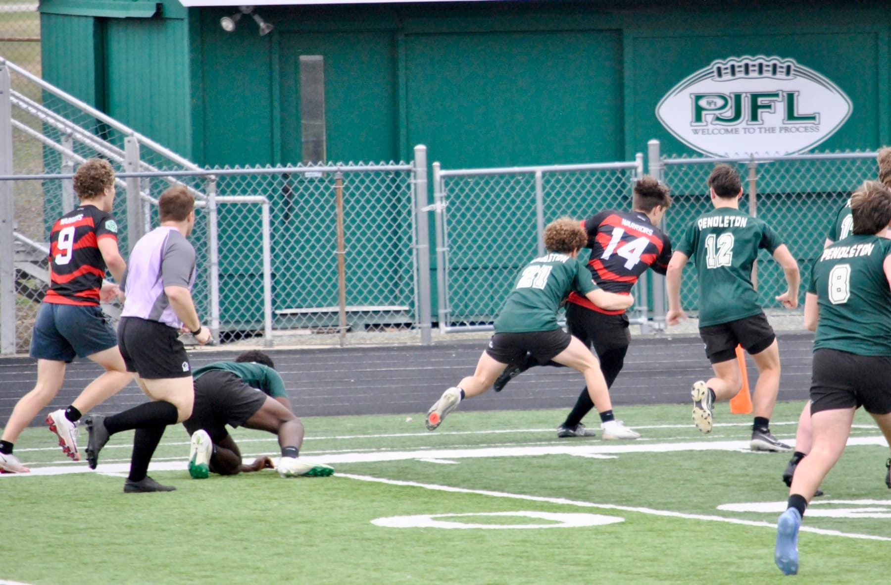 A Fortivus player carrying the ball during match play