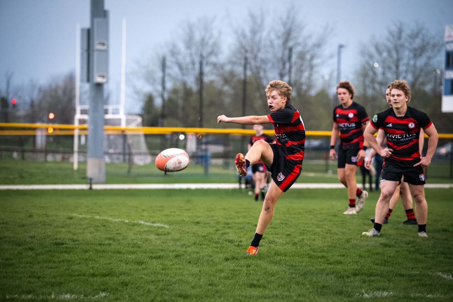 Fortivus players moving the ball in open play