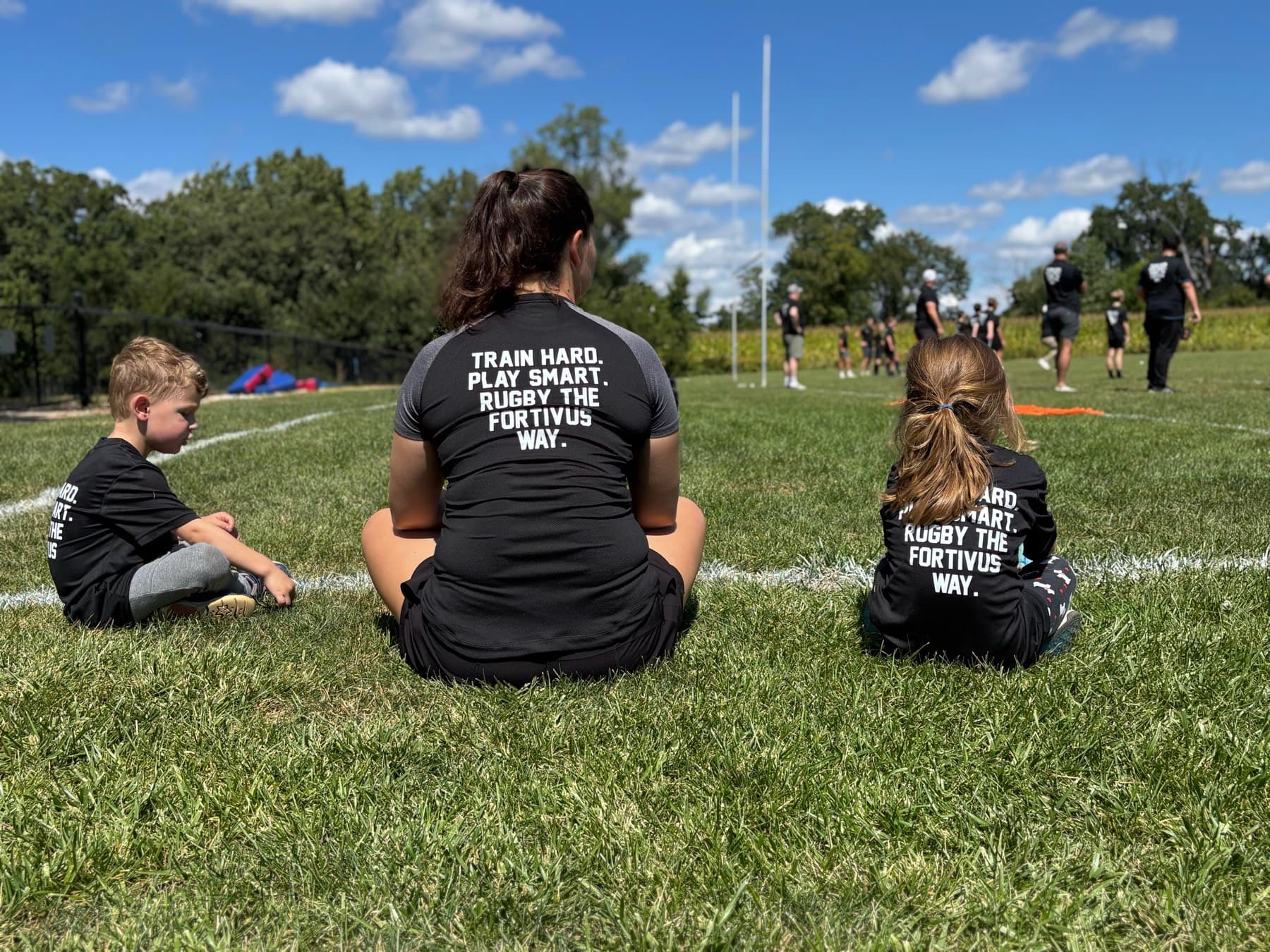Fortivus players watching training from the sideline